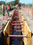 Krings, KIF, krings international france, trench shoring, trench box, slide rail, slide rail system, linéaire, trench, excavation, framework, pit, safety, sewer network, drainage network, public works, pipe puller, KVL, KS, KS60, KS100, KKP, DGPV, EGPV, DGFP, grab, pipe grab, heavy duty trench box, light box, sheet piles